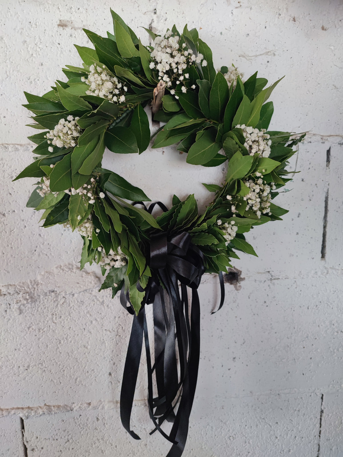 Corona d'alloro con fiocco e vel di sposa